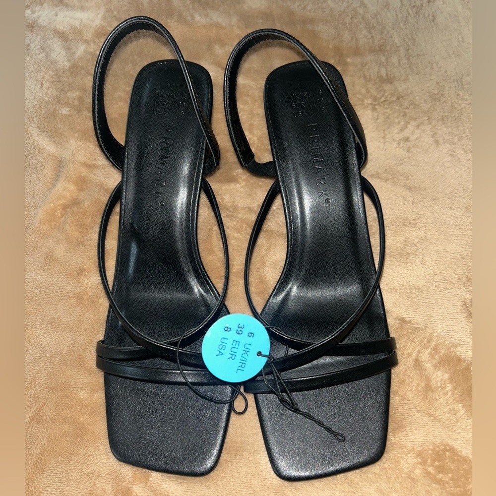 Strappy black heels